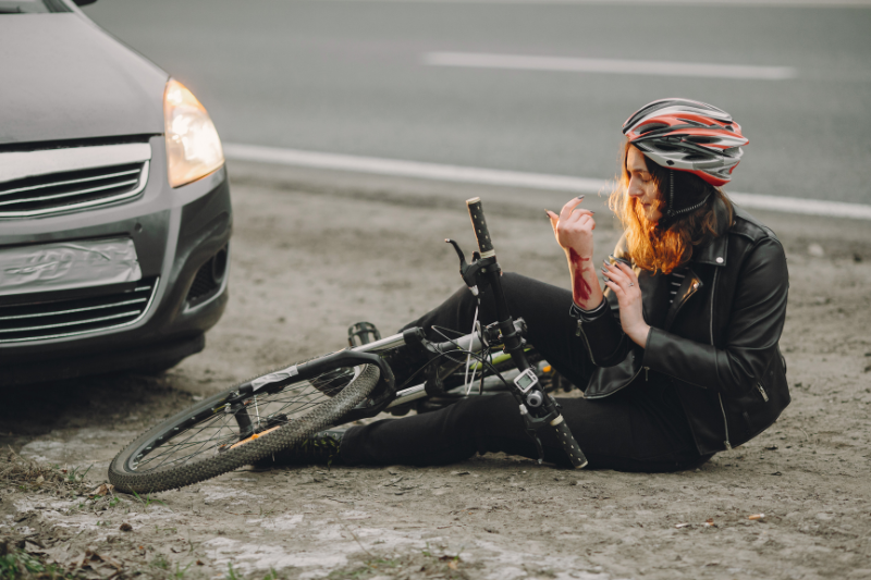 Bicycle Accidents Damaged vehicles at a busy intersection - Mercer Legal Group services