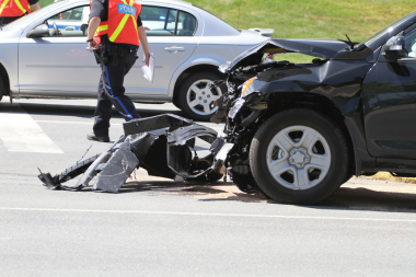 Accident scene with a bike and car collision - Mercer Legal Group services