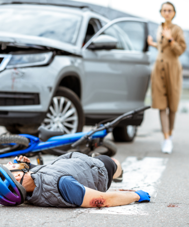 Bicycle accident scene with a damaged helmet - Mercer Legal Group services