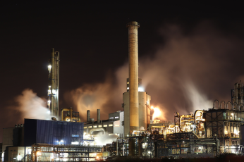 Industrial factory emitting smoke - Mercer Legal Group services