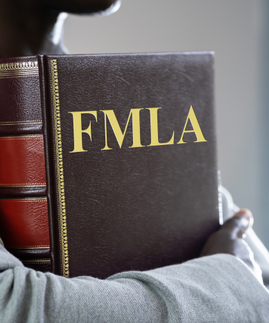 Family Medical Leave Act (FMLA) book for workplace compliance - Mercer Legal Group services.