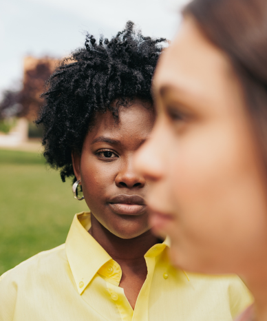 Young woman discussing workplace equality and rights - Mercer Legal Group services.