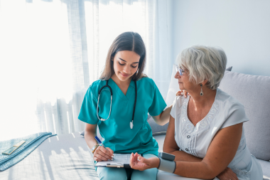 Doctor consulting with a senior patient - Mercer Legal Group services