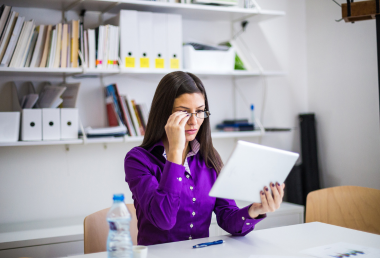 Female attorney reviewing documents - Mercer Legal Group services