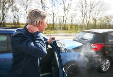 Man documenting car accident scene - Mercer Legal Group services