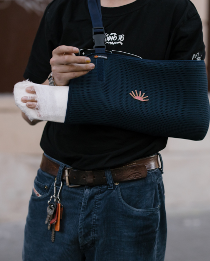 Injured person resting with an arm sling - Mercer Legal Group services