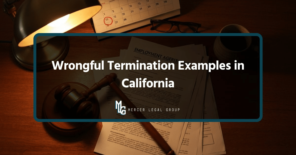 Wooden gavel atop an employment agreement on a warm wood desk with brass lamp, calendar, and reading glasses, illustrating wrongful termination examples in California