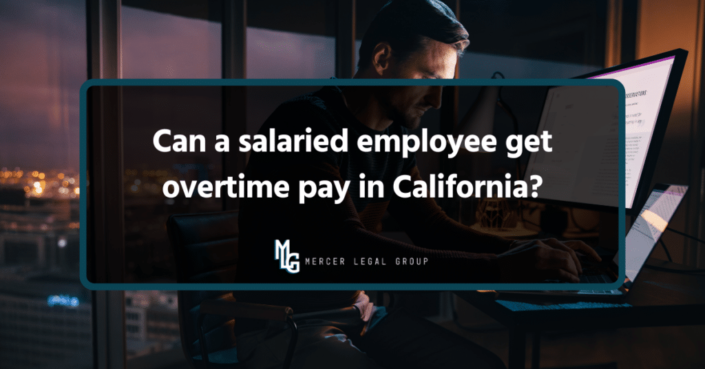 Salaried employee working late at a computer in an office, illustrating California overtime pay questions for exempt and nonexempt workers.
